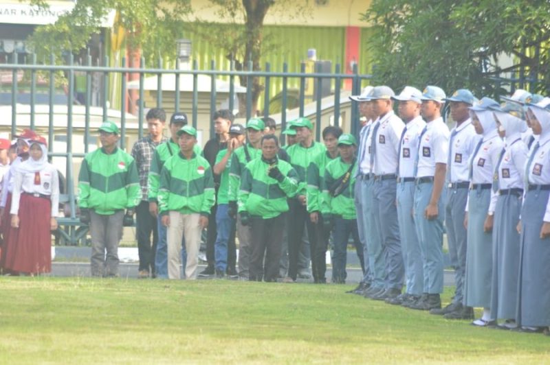 Foto : Grab ojek online Baturaja mengikuti apel gelar pasukan operasi Musi tahun 2024 di halaman Mapolres OKU 