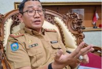 Foto : Kepala BKAD OKU Setiawan AK MM