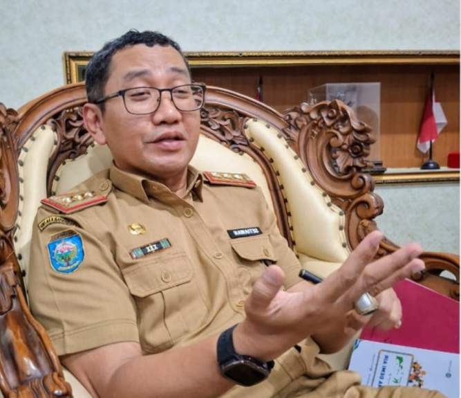 Foto : Kepala BKAD OKU Setiawan AK MM