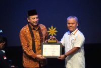 Foto Wawan-Peristiwaterkini; Penyerahan Penghargaan LAZISMU Terbaik tingkat Nasional kepada LAZISMU DIY