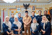 foto: pose Persatuan Wartawan Indonesia (PWI) Kabupaten Lampung Tengah bersama Bupati Lampung tengah