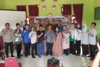 foto: pose bersama pengurus koperasi merah putih dea battu winangun, camat lubuk raja, pemerintah desa, babinsa, babinkamtibmas