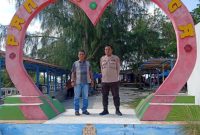 FOTO: Polsek Labuhan Ruku Tingkatkan Keamanan di Lokasi Wisata Pantai